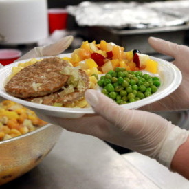 handing out a meal